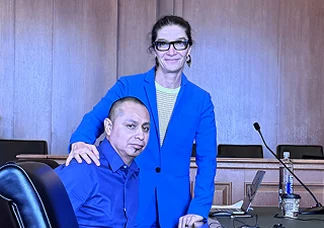 Lina Stillman and her client in the courtroom.